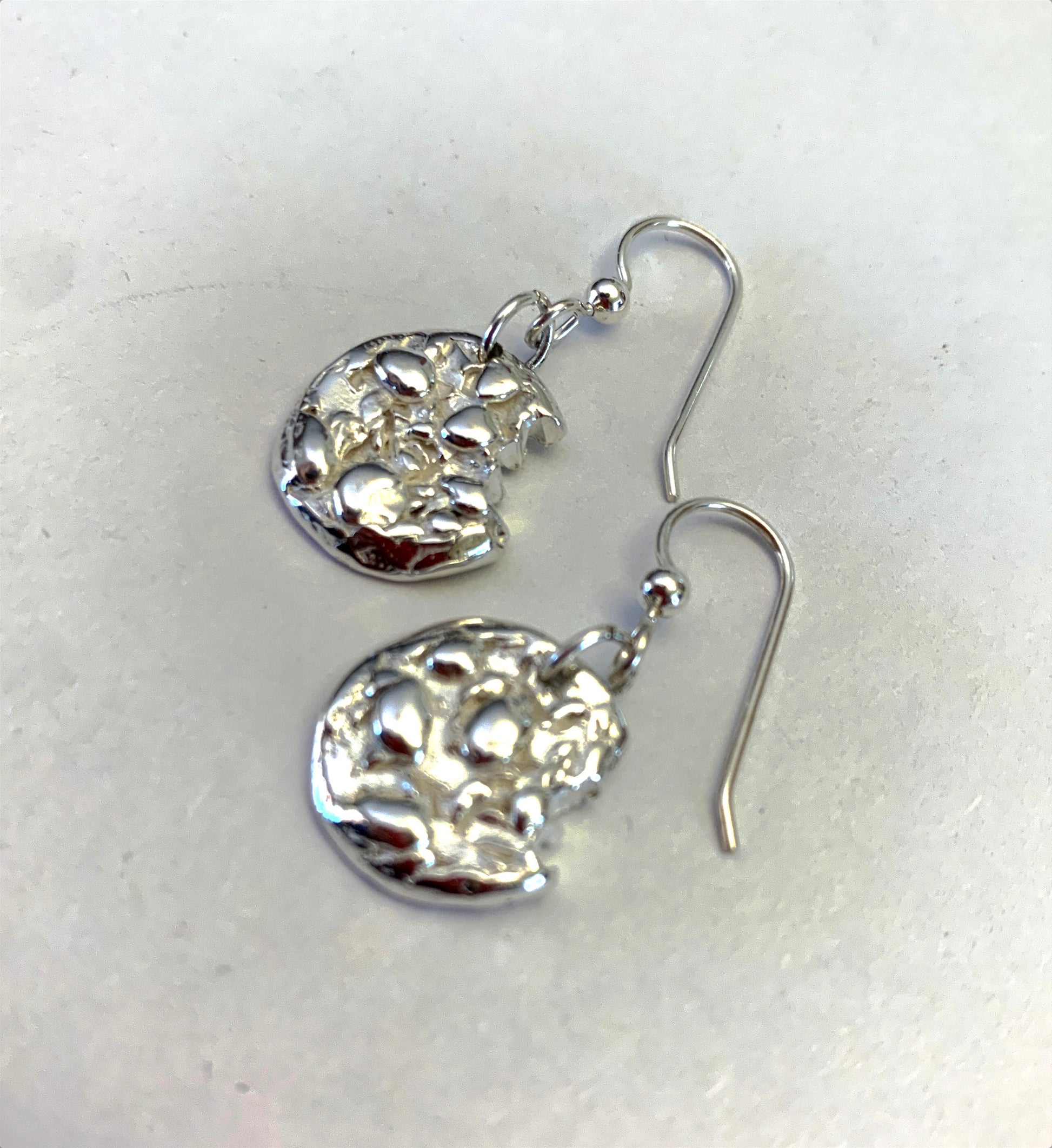 sterling silver oatmeal cookie dangle earrings with a bite taken out