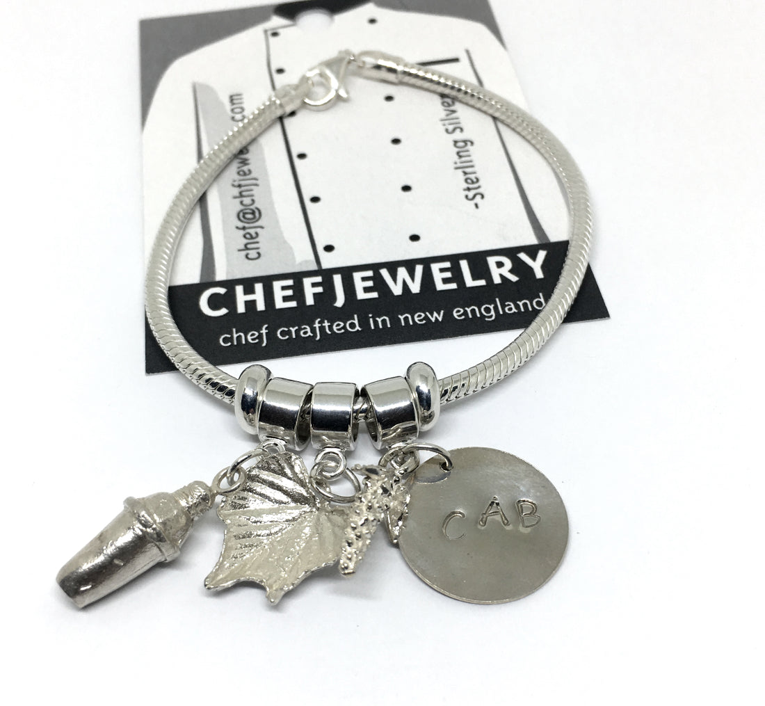 Sterling charm bracelet with cocktail shaker, grape leaves and handstamped charm