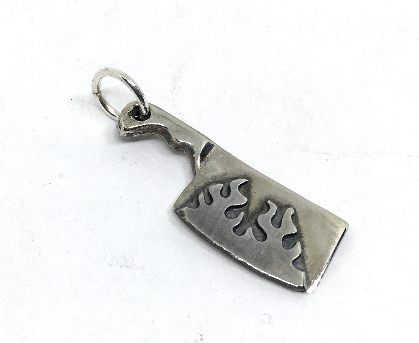 flaming cleaver charm in sterling silver