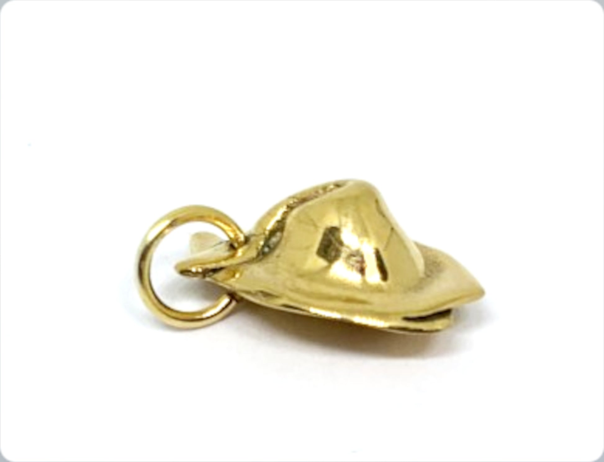 side view of yellow gold plated wonton charm